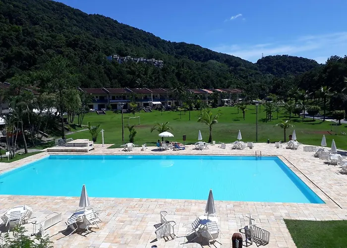 Duplex família em condomínio com área verde e portaria 24horas Guarujá